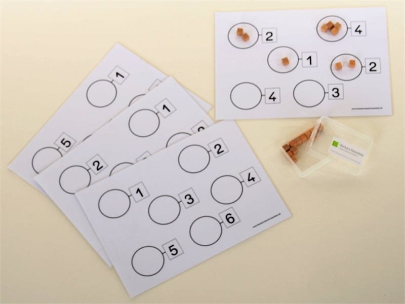 Mengen bis 6 mit Holzwürfeln bilden